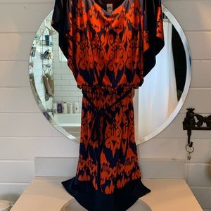 Orange and Navy dress. Knee length. Worn one time